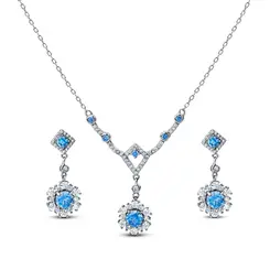 Conjunto Prata Rodinada Flor Cravejada com Zircônias Azuis